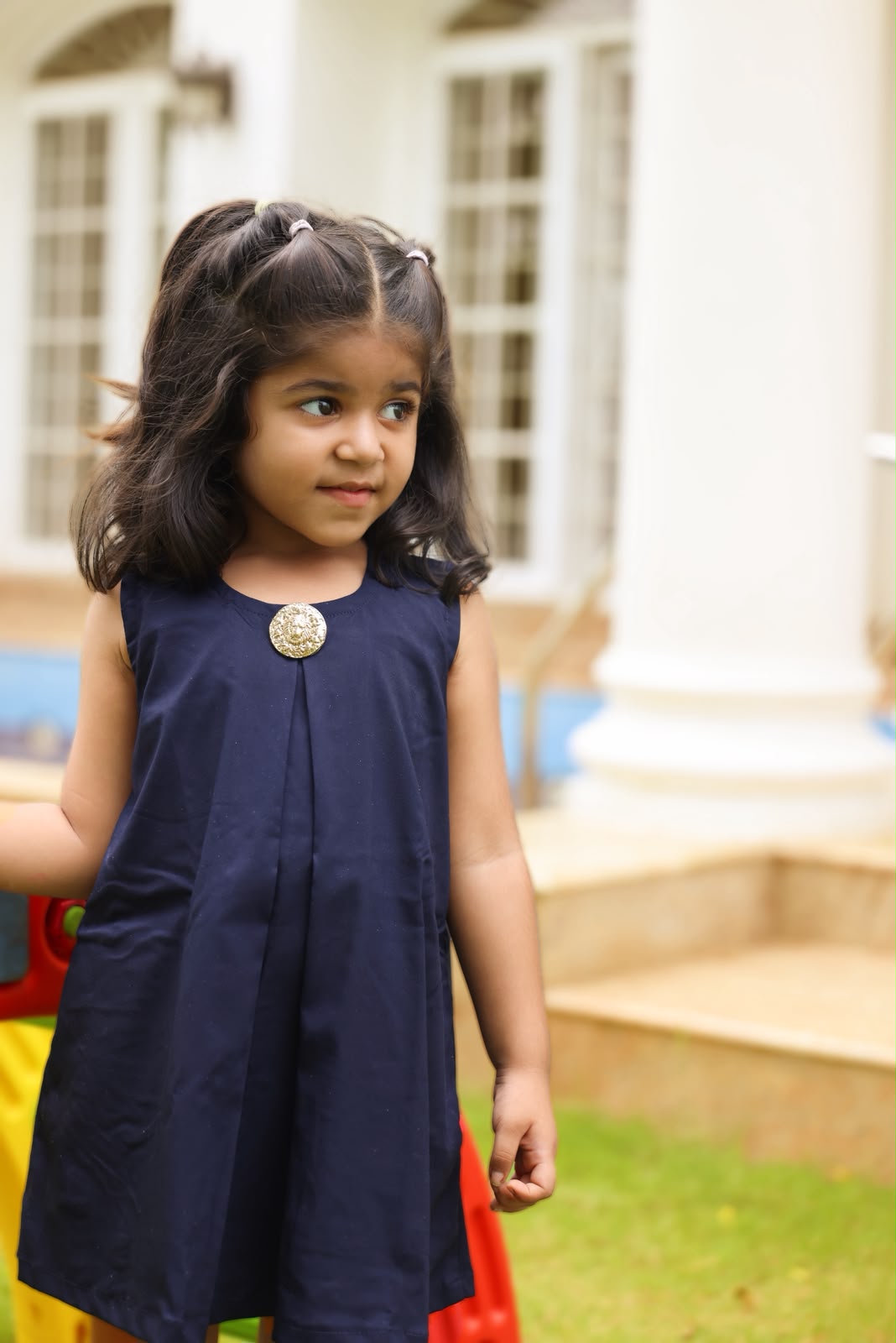 Navy dress with gold button